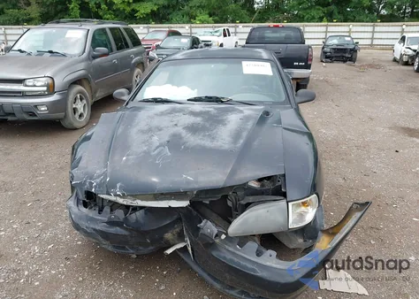 1997 Ford Mustang из США, поврежденный, VIN 1FALP4046VF199293